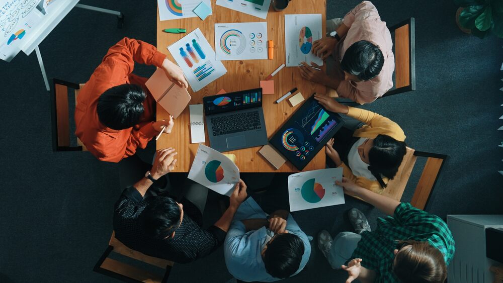 A top view of a team working in office
